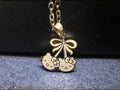 Hk Bow Necklace